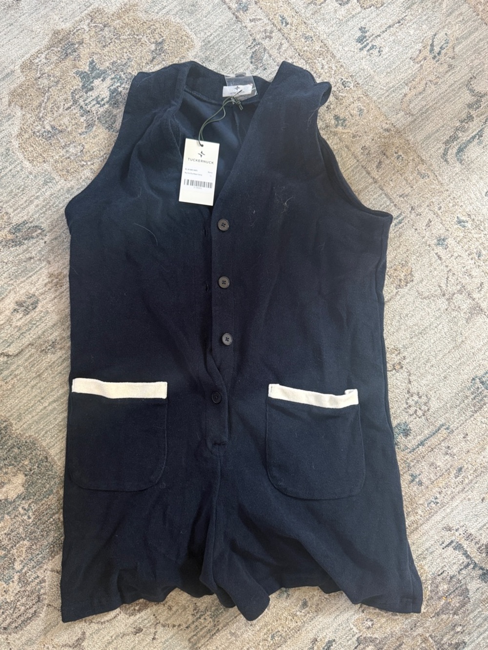 Tuckernuck Sleeveless Navy Button Front Romper withPocket Trim. Never worn.